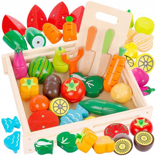  Hölzernes Kinderspiel mit mehrfarbigem Obst und Gemüse zum Schneiden auf einem Magneten