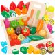  Hölzernes Kinderspiel mit mehrfarbigem Obst und Gemüse zum Schneiden auf einem Magneten