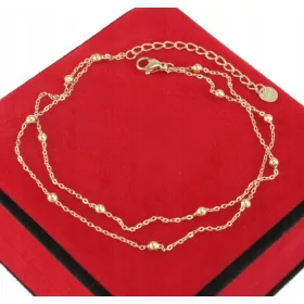  DOPPELTES KNÖCHEL-ARMBAND AUS GOLD, CHIRURGENSTAHL