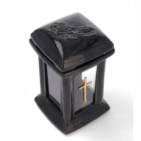    Schwarze Kapellenkerze aus Keramik mit einer Rose und einem Kreuz