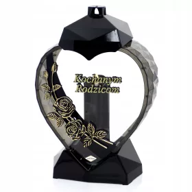    Eine elegante herzförmige Kerze mit Rosenblüte für Eltern, Gold