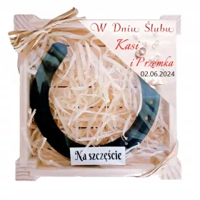    Ein Glückshufeisen für das Brautpaar, ein Hochzeitssouvenir mit ihren Namen