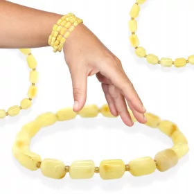    BERNSTEIN-Armband an einem elastischen Band, milchiger baltischer Bernstein-Rollenfilm