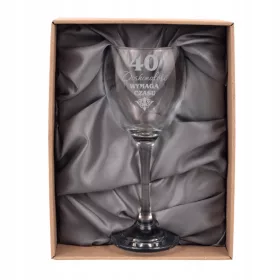    Ein Geburtstagsglas mit Dekorationen, ein Geschenk zum 40. Geburtstag einer Frau