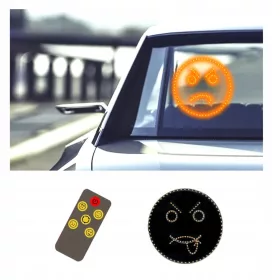    Lustiges Emoticon für das Fenster. Emoticon Lächeln, Zunge, wütend, LED-Auge + Fernbedienung