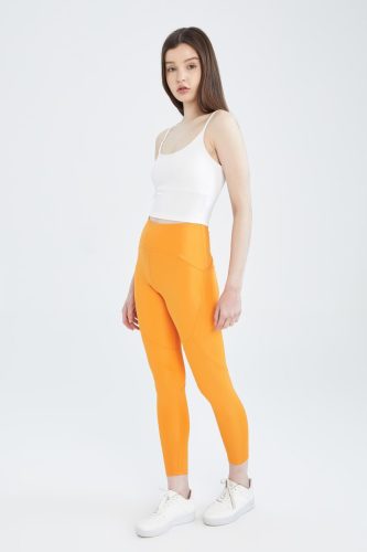  ORANGE GLATTE LEGGINGS SPORTNÄHTE 7/8 DEFACTO M